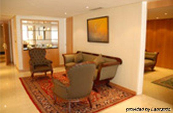 Eurobuilding Hotel & Suites Каракас Номер фото A living room in a typical condominium